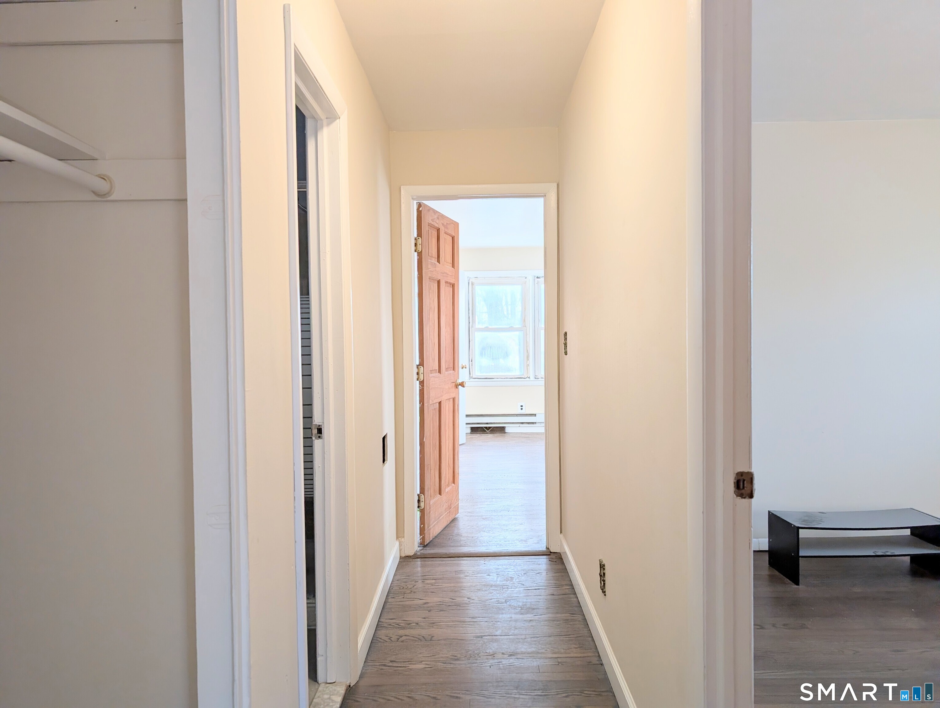 139 Little Deer Road Bridgeport, CT 06606 - Photo 26 of 35 a view of a hallway with a door and a hallway