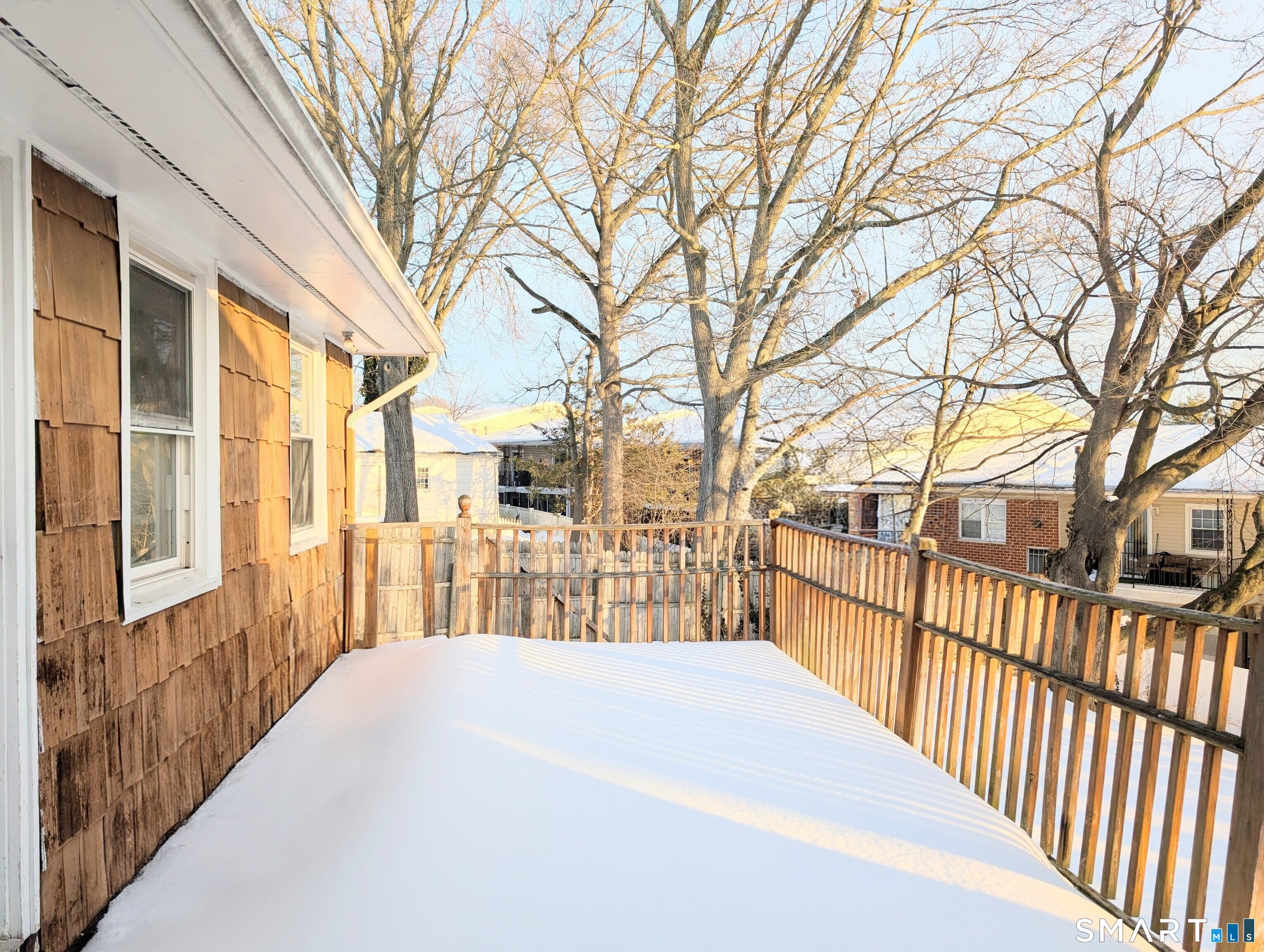 139 Little Deer Road Bridgeport, CT 06606 - Photo 34 of 35 a view of a large trees with wooden fence