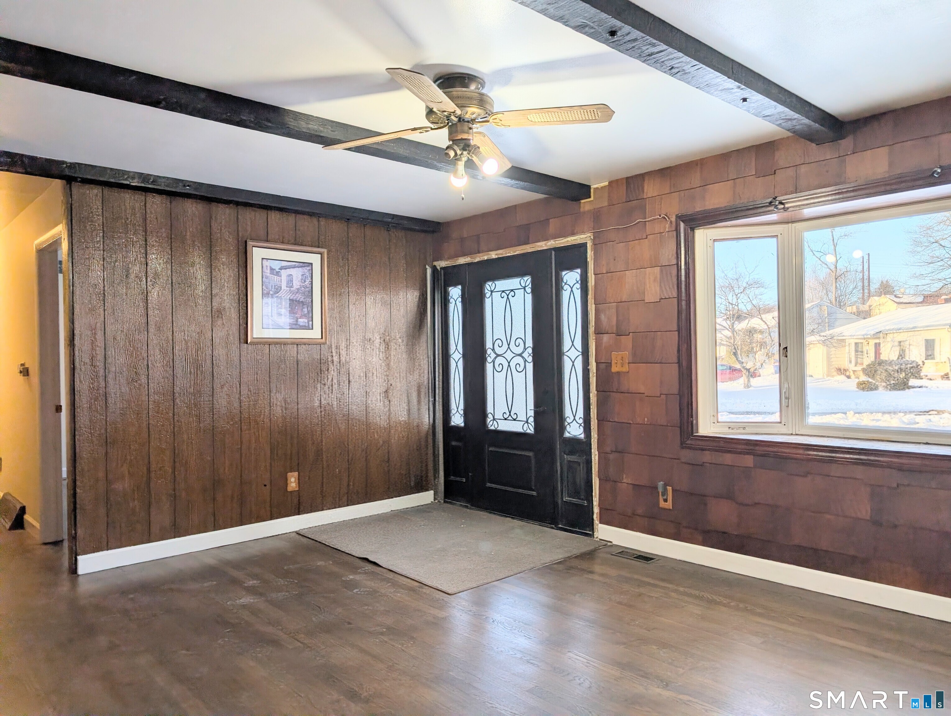 139 Little Deer Road Bridgeport, CT 06606 - Photo 10 of 35 an empty room with windows and fan