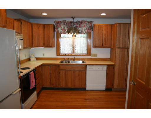 124 Maple Avenue Rutland, MA 01543 - Photo 1 of 1 a kitchen with stainless steel appliances granite countertop a stove a sink dishwasher and a refrigerator