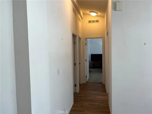 a bathroom with a sink vanity and a mirror