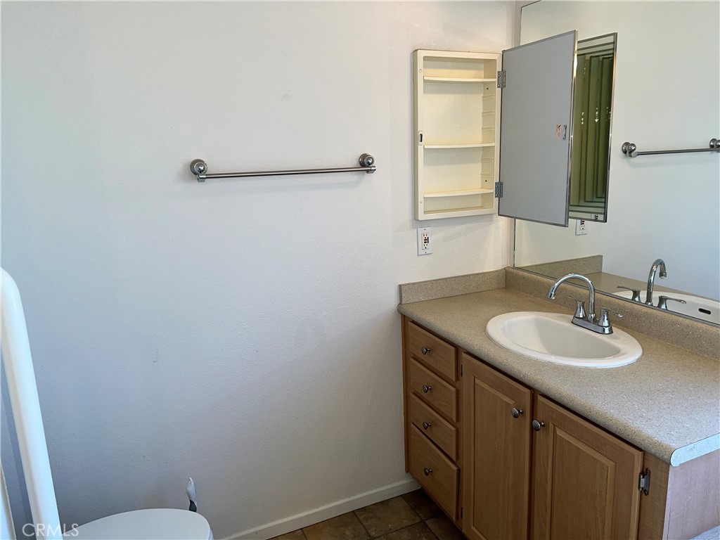 1226 Main Street, Unit 14 Cambria, CA 93428 - Photo 57 of 63 Sink & Medicine cabinet