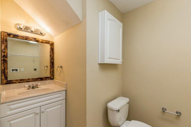 808 Valley Road Crestview, FL 32539 - Photo 15 of 35 a bathroom with a sink toilet and vanity