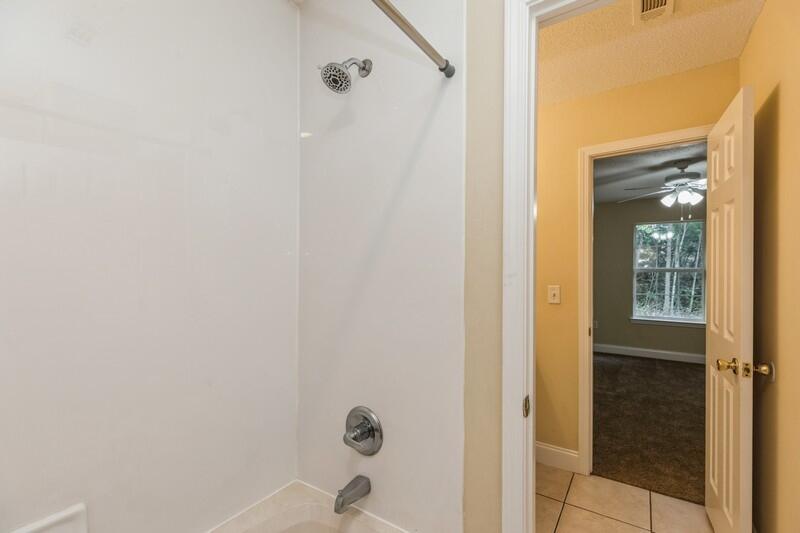 808 Valley Road Crestview, FL 32539 - Photo 21 of 35 a bathroom with a shower