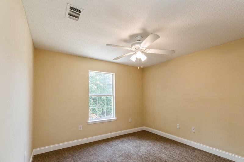 808 Valley Road Crestview, FL 32539 - Photo 22 of 35 an empty room with a window