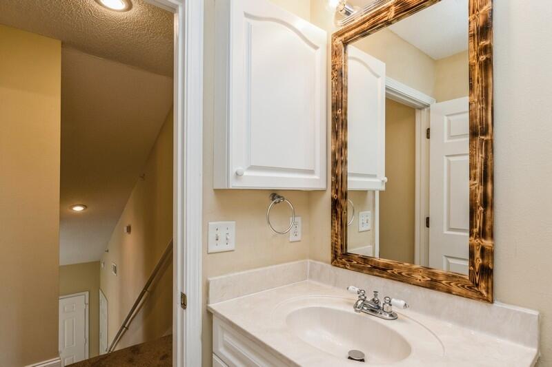 808 Valley Road Crestview, FL 32539 - Photo 29 of 35 a bathroom with a sink and a mirror