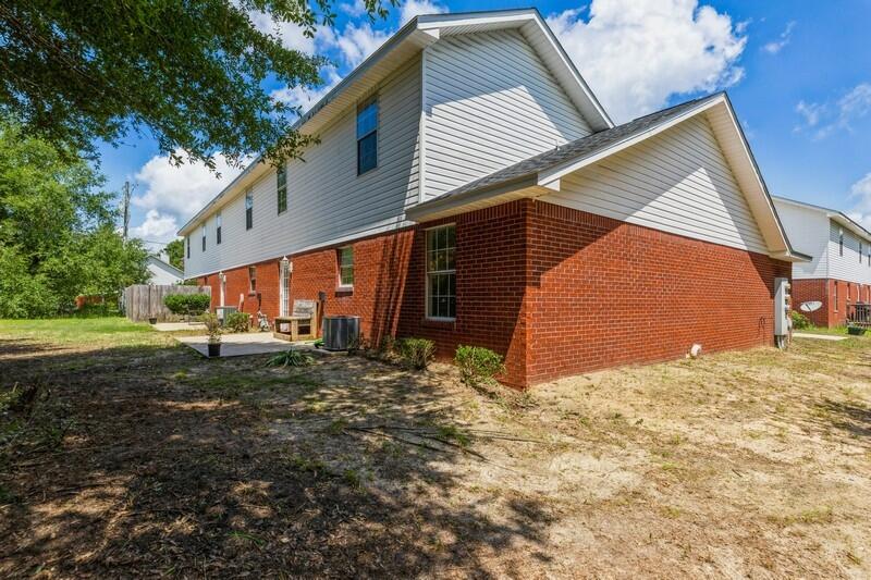 808 Valley Road Crestview, FL 32539 - Photo 33 of 35 a view of a house with backyard