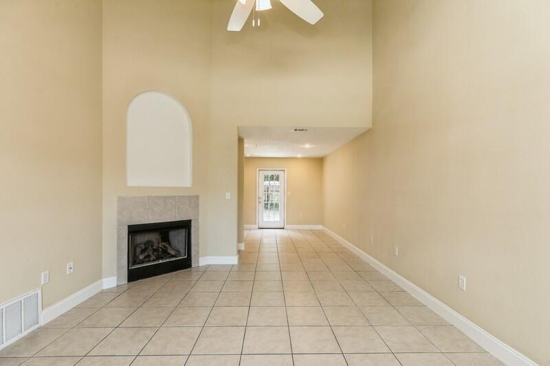 808 Valley Road Crestview, FL 32539 - Photo 8 of 35 a view of an empty room with a fireplace