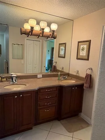 a bathroom with a bathtub and a window