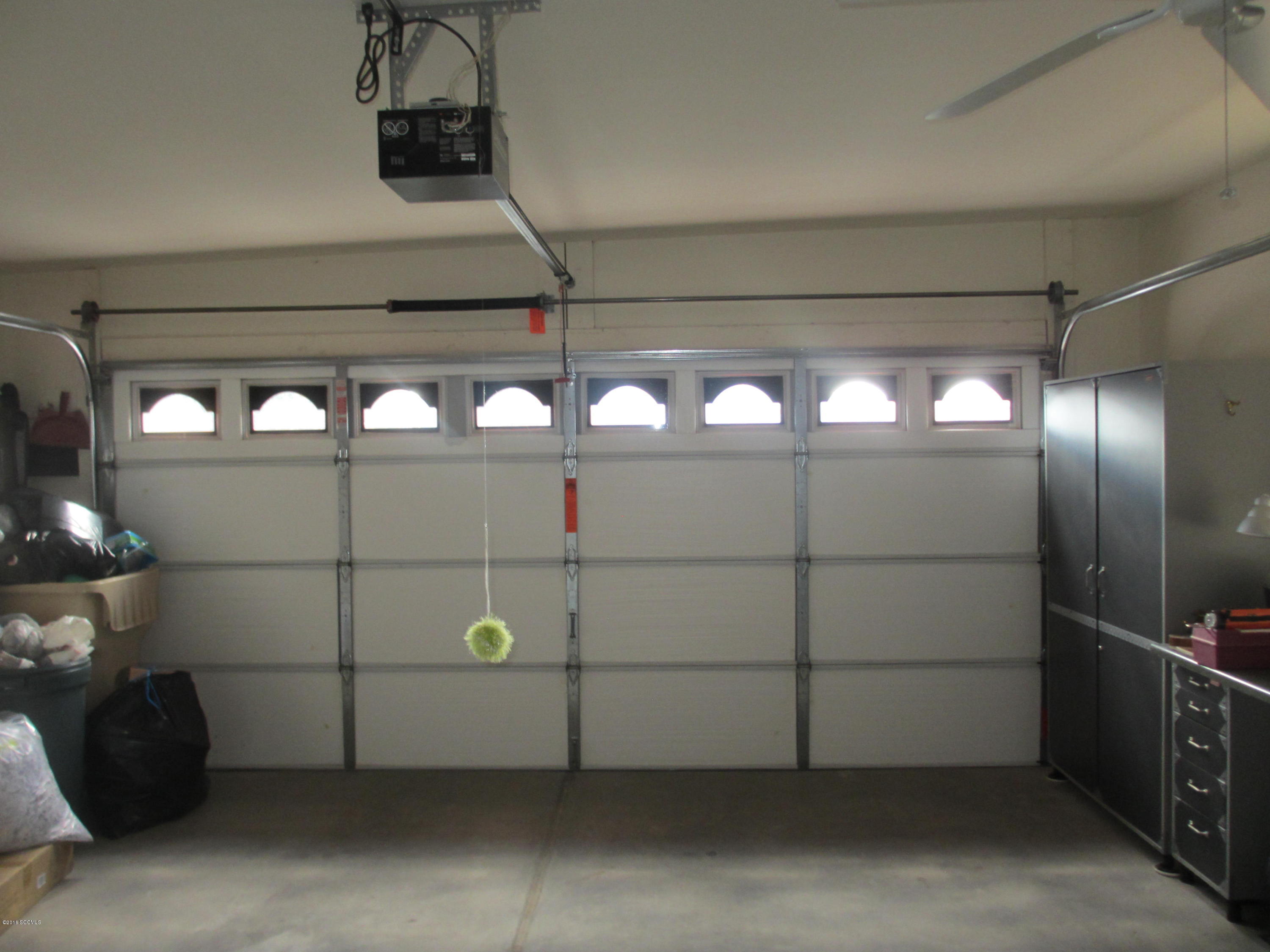 353 Via Bella Donna Rio Rico, AZ 85648 - Photo 25 of 44 a view of a room with racks on the wall