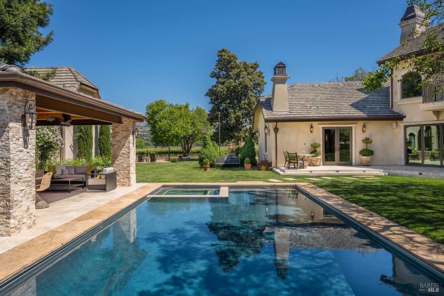 5045 Big Ranch Road Napa, CA 94558 - Photo 41 of 71 a view of a house with pool and a yard