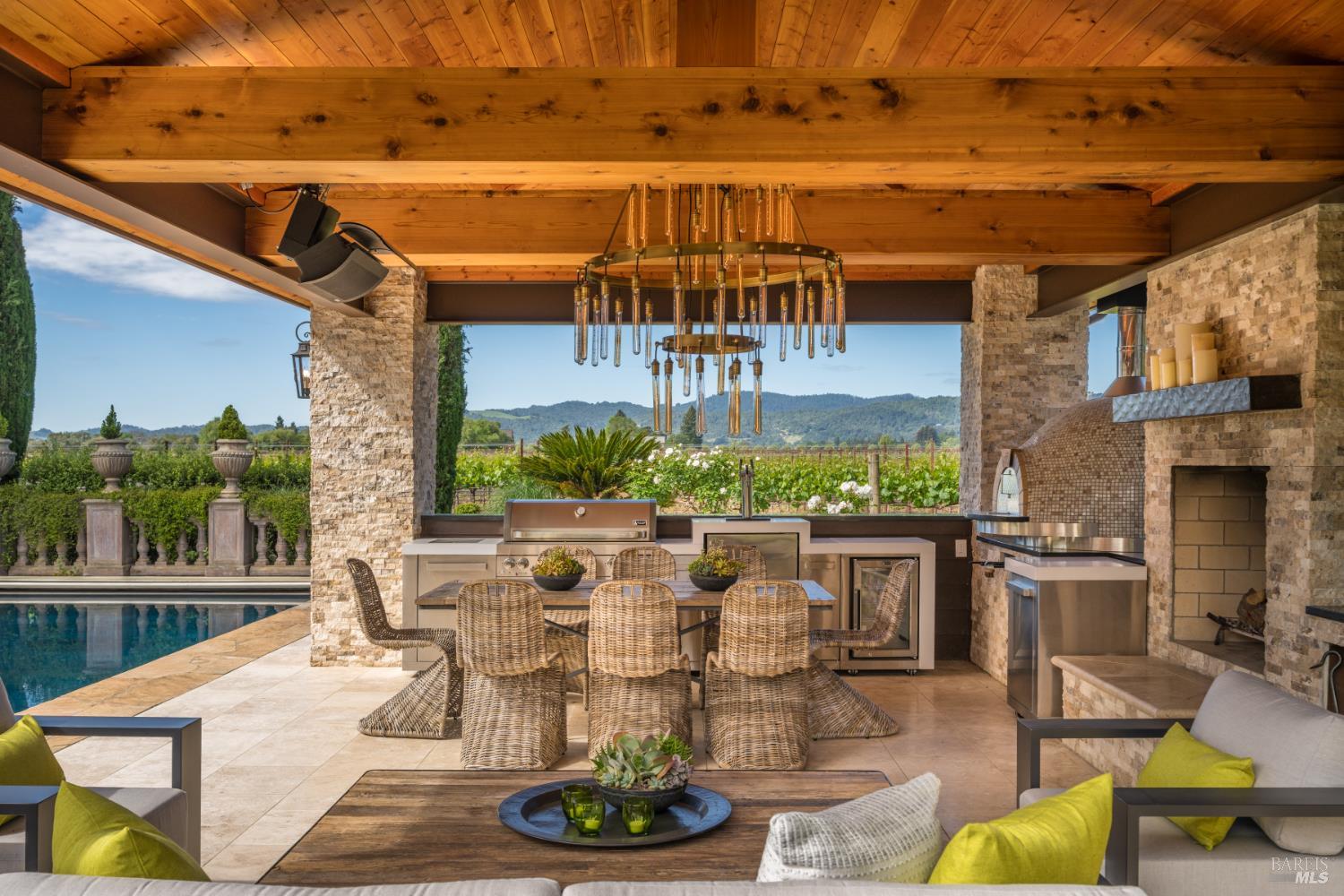 5045 Big Ranch Road Napa, CA 94558 - Photo 5 of 71 a view of a patio with dining table and chairs with wooden floor