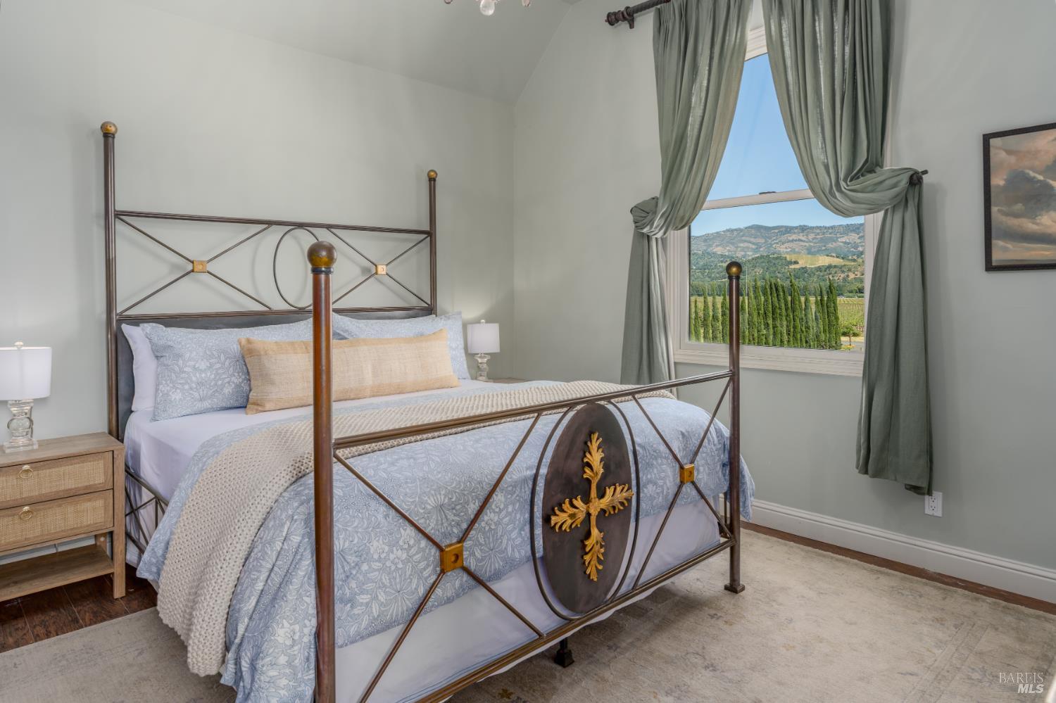 5045 Big Ranch Road Napa, CA 94558 - Photo 54 of 71 a bedroom with a bed a window and potted plant