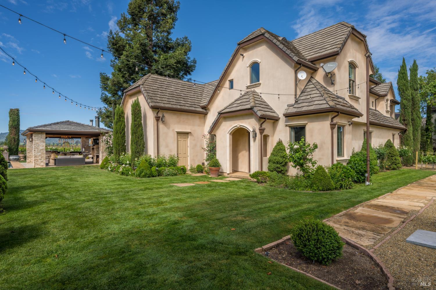 5045 Big Ranch Road Napa, CA 94558 - Photo 57 of 71 a front view of a house with a garden