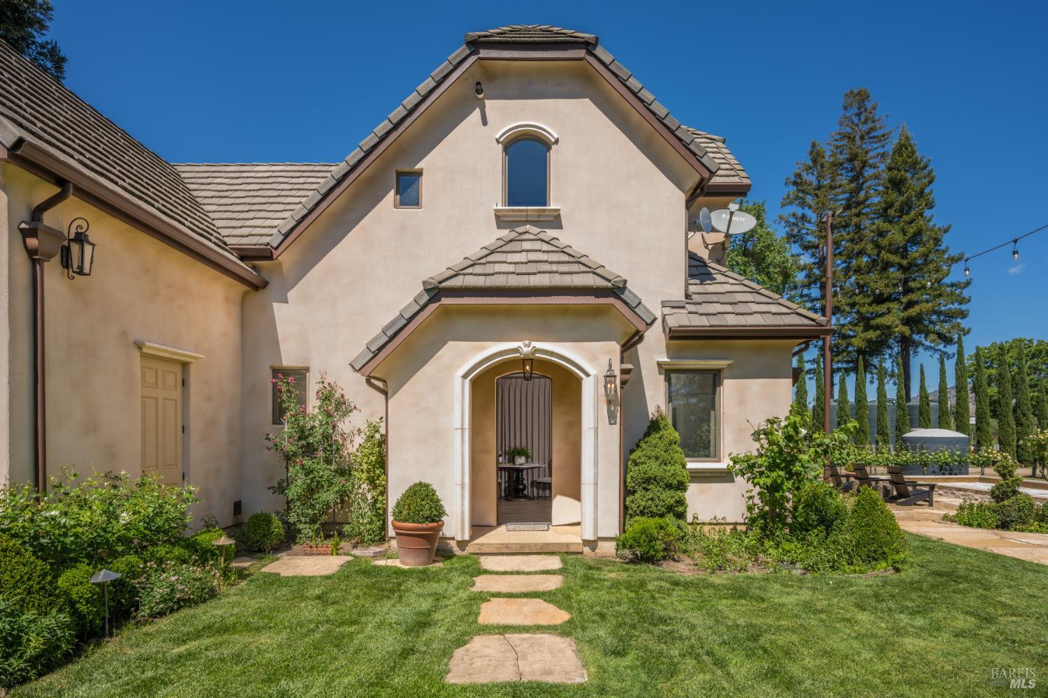 5045 Big Ranch Road Napa, CA 94558 - Photo 58 of 71 a front view of a house with garden