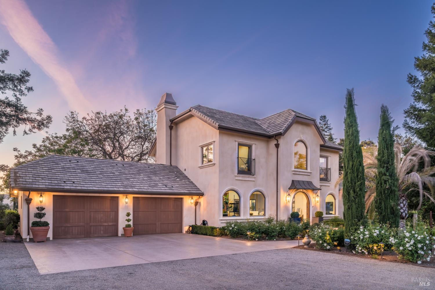 5045 Big Ranch Road Napa, CA 94558 - Photo 9 of 71 a front view of a house with a yard and garage