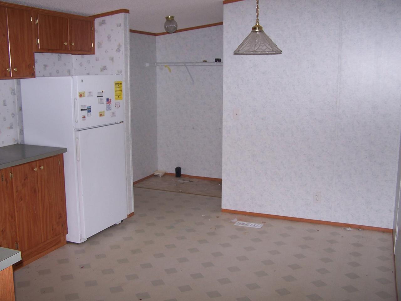 1397 Bottom Meadow Road Thaxton, VA 24174 - Photo 5 of 5 a kitchen with a refrigerator and a stove