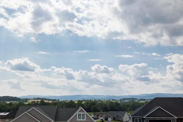 a kitchen with a refrigerator and a sink
