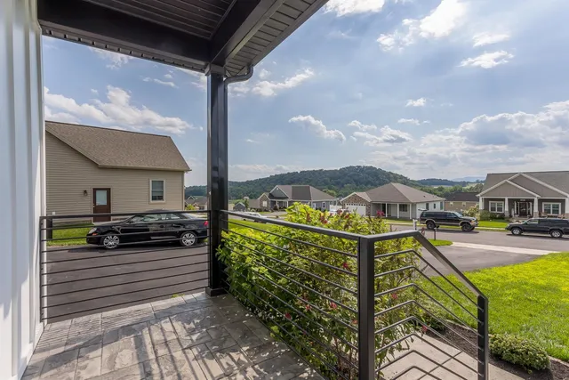 a view of a balcony with an outdoor space