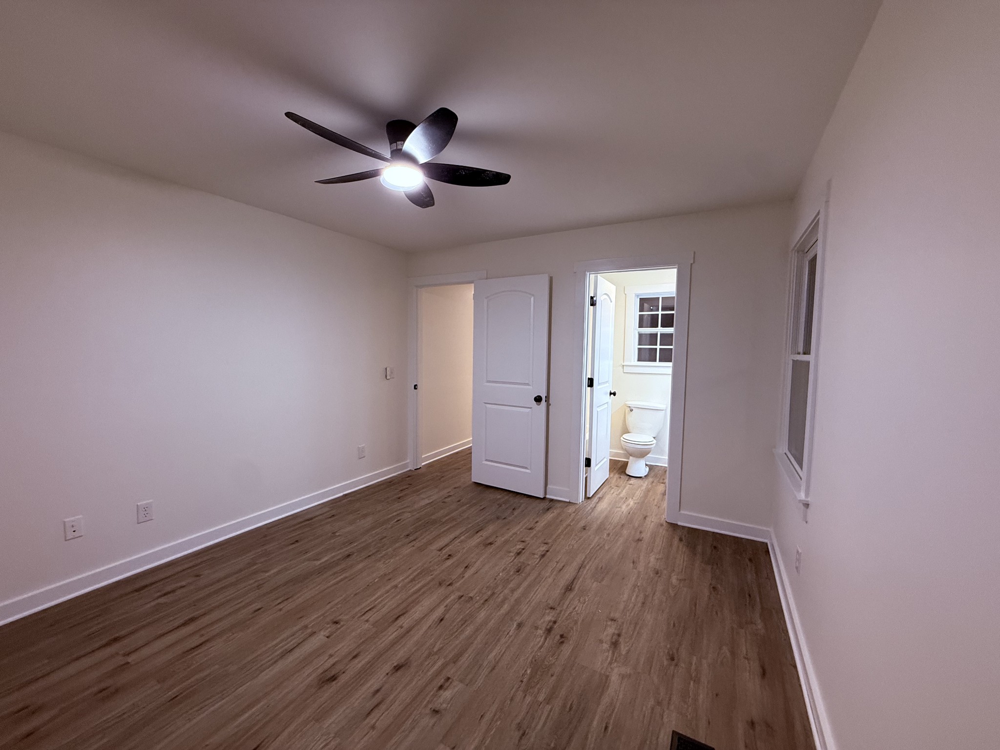 622 Beech Street Centerville, TN 37033 - Photo 18 of 30 a view of an empty room with wooden floor