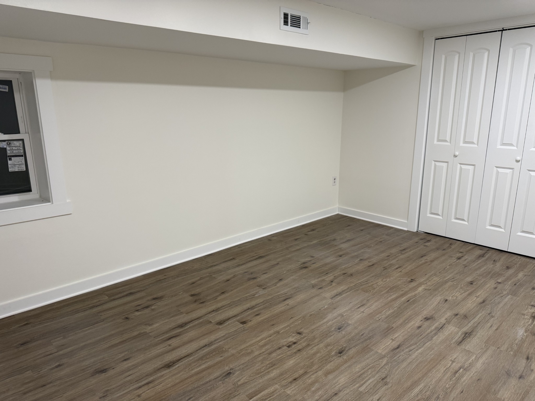622 Beech Street Centerville, TN 37033 - Photo 22 of 30 a view of an empty room with wooden floor