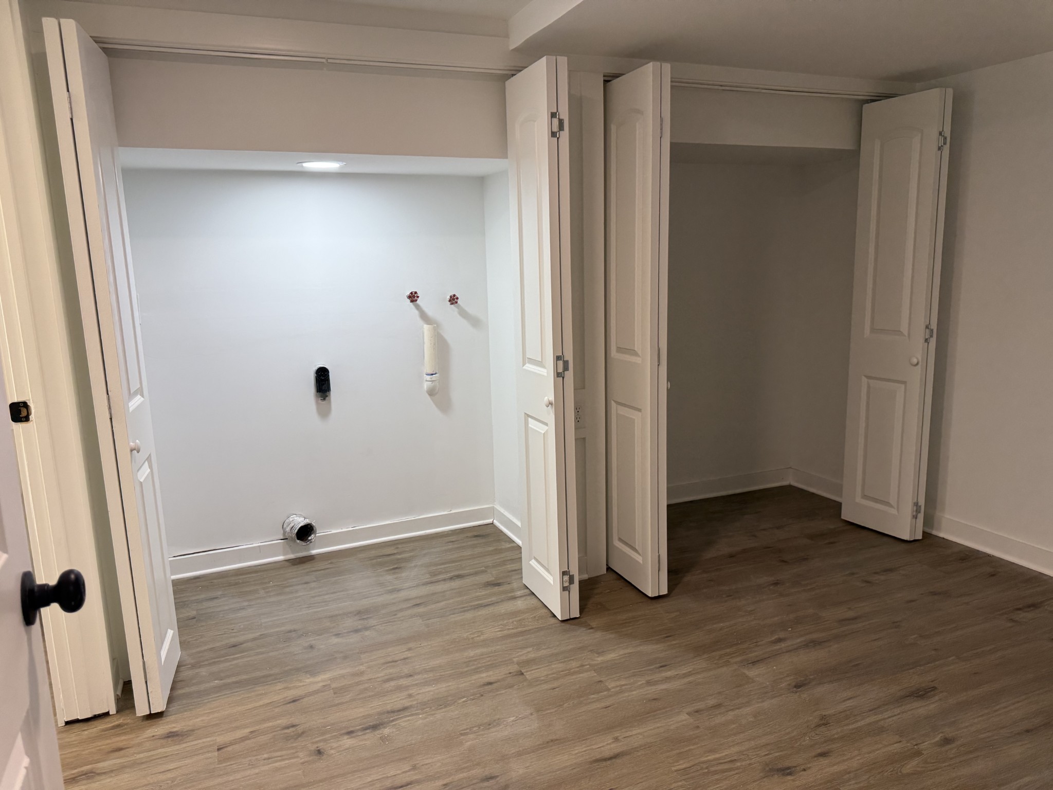 622 Beech Street Centerville, TN 37033 - Photo 27 of 30 an empty room with wooden floor and closet