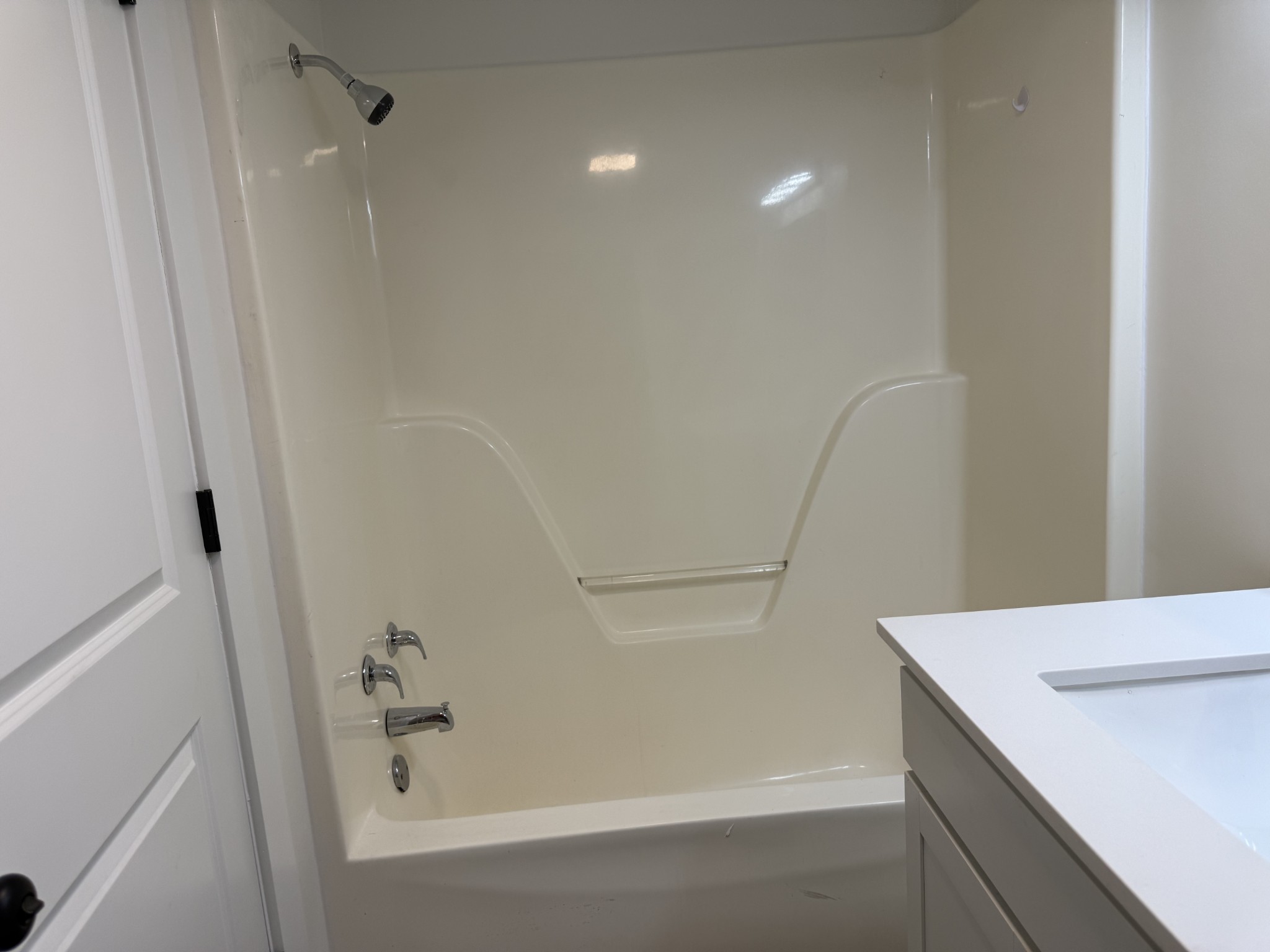 622 Beech Street Centerville, TN 37033 - Photo 30 of 30 a bathroom with a bathtub and shower