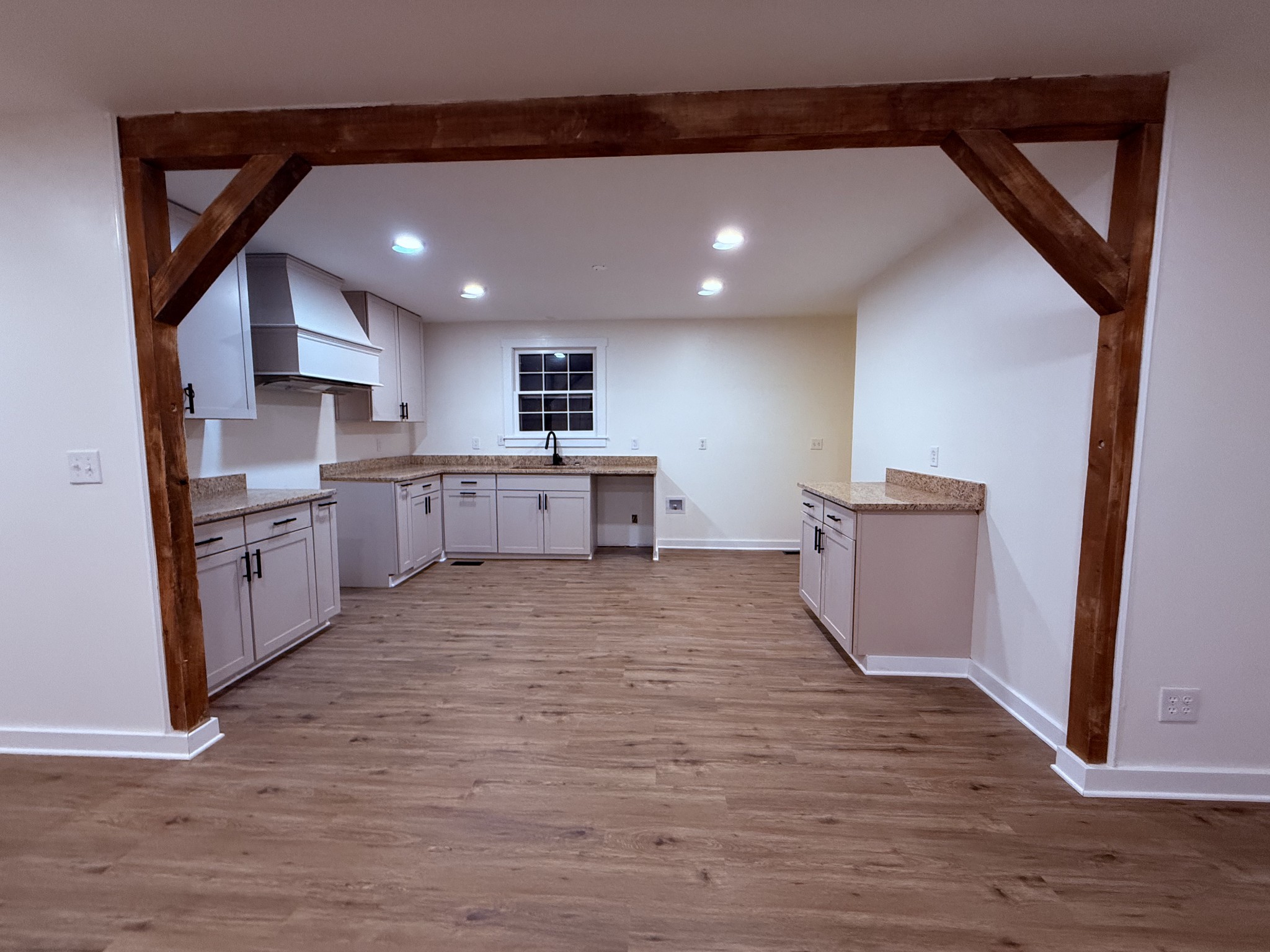 622 Beech Street Centerville, TN 37033 - Photo 4 of 30 a large kitchen with stainless steel appliances granite countertop a large stove a sink dishwasher and a refrigerator