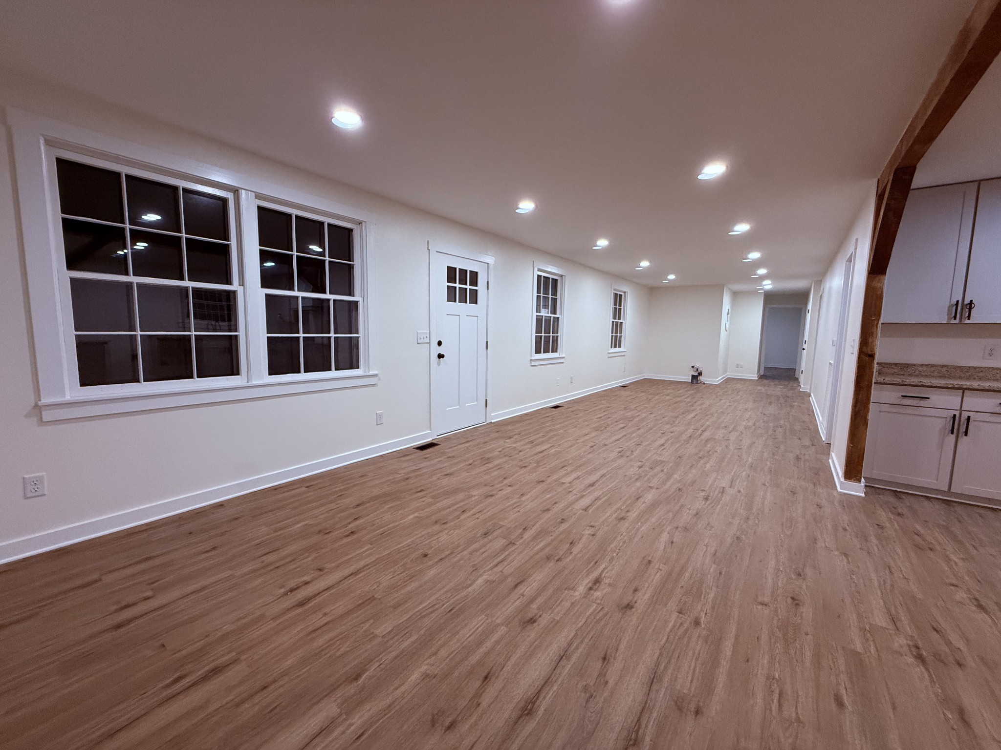 622 Beech Street Centerville, TN 37033 - Photo 5 of 30 a view of empty room with wooden floor and windows