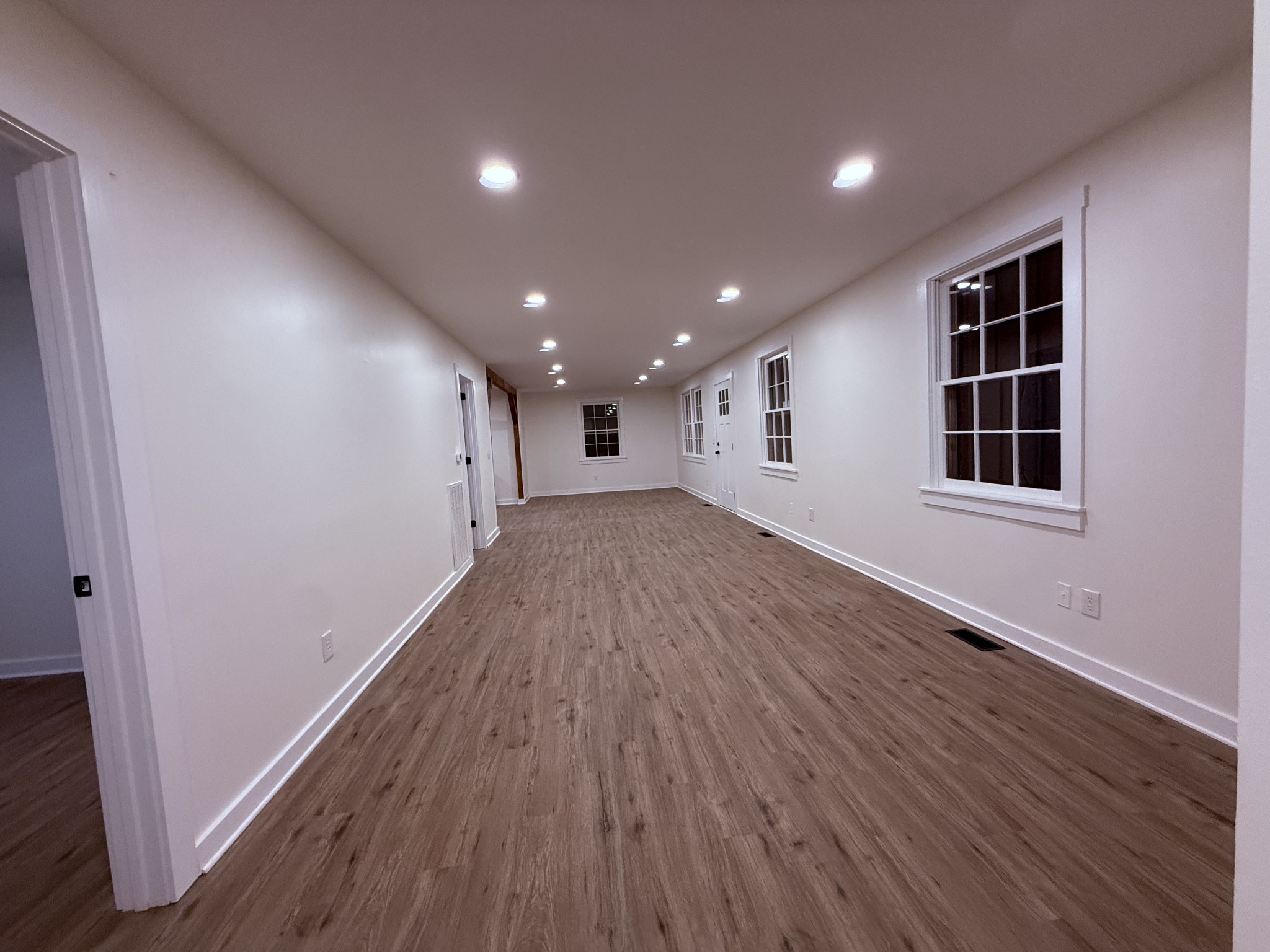 622 Beech Street Centerville, TN 37033 - Photo 9 of 30 wooden floor in an empty room with a window