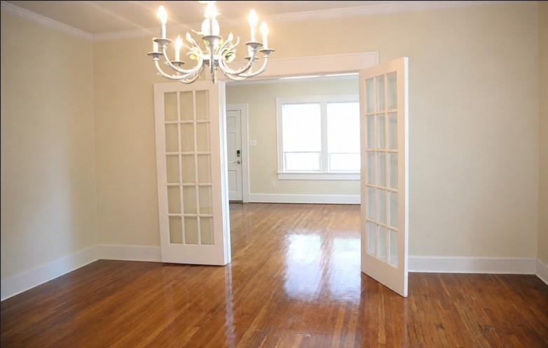 1500 Bonham Street Commerce, TX 75428 - Photo 6 of 29 a view of empty room with wooden floor
