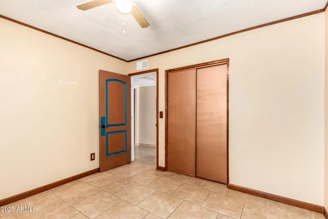 a view of a room with wooden walls