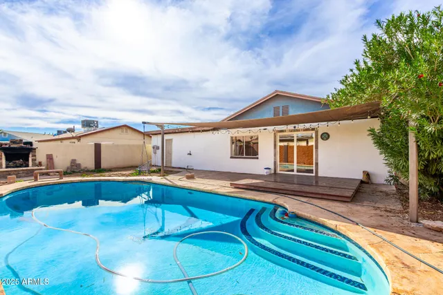 a front view of house with yard and seating area