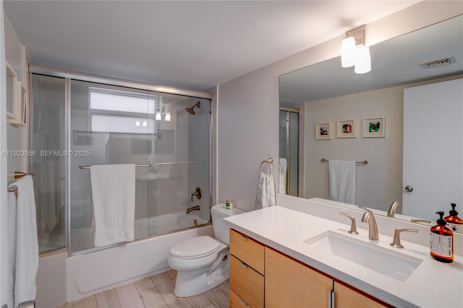 55 Ocean Ln Drive, Unit 2033 Key Biscayne, FL 33149 - Photo 12 of 21 a bathroom with a sink a toilet and shower