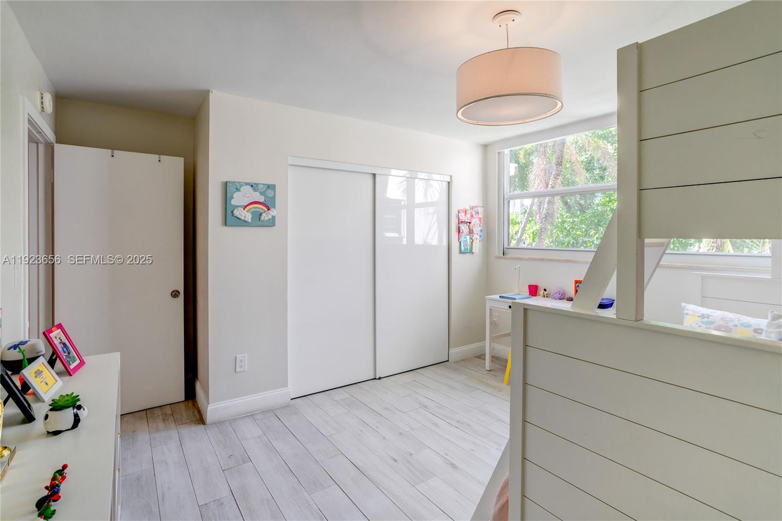 55 Ocean Ln Drive, Unit 2033 Key Biscayne, FL 33149 - Photo 14 of 21 a room with furniture and window