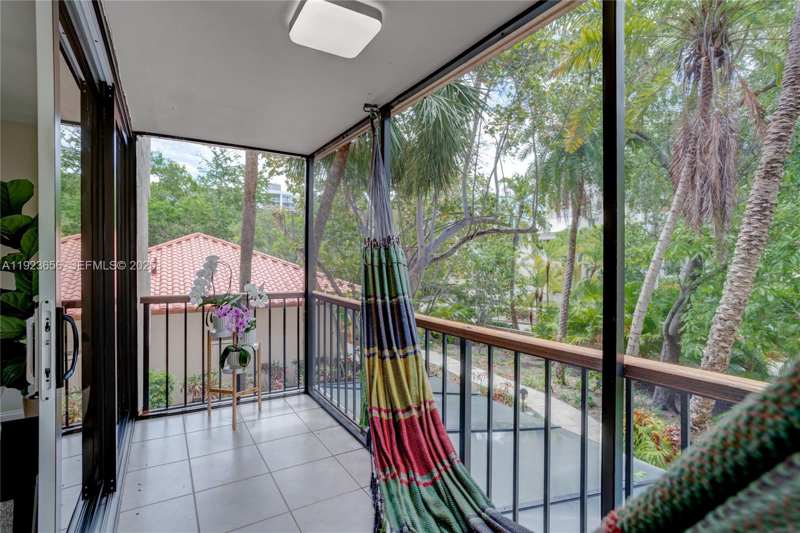 55 Ocean Ln Drive, Unit 2033 Key Biscayne, FL 33149 - Photo 19 of 21 a view of a city from a balcony