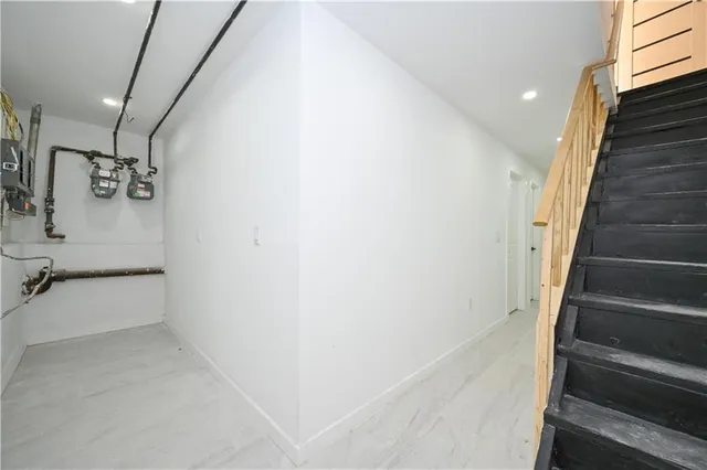 a view of bathroom with bathtub and stairs