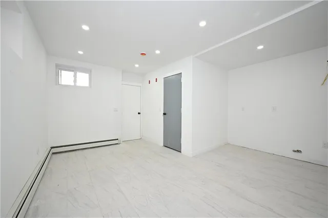 a view of a swimming pool with lounge chair