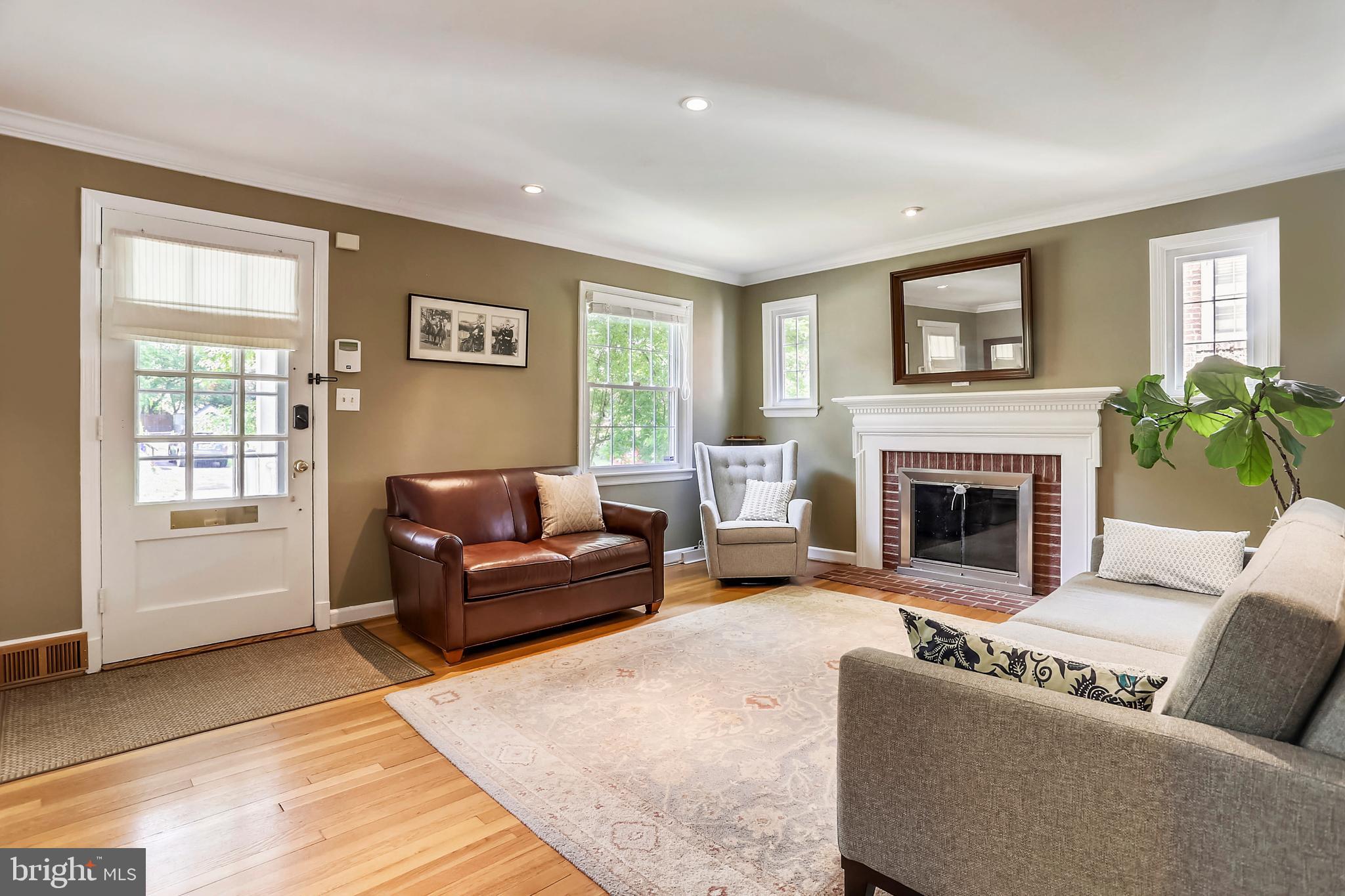 314 Penwood Road Silver Spring, MD 20901 - Photo 6 of 39 Living room with fireplace