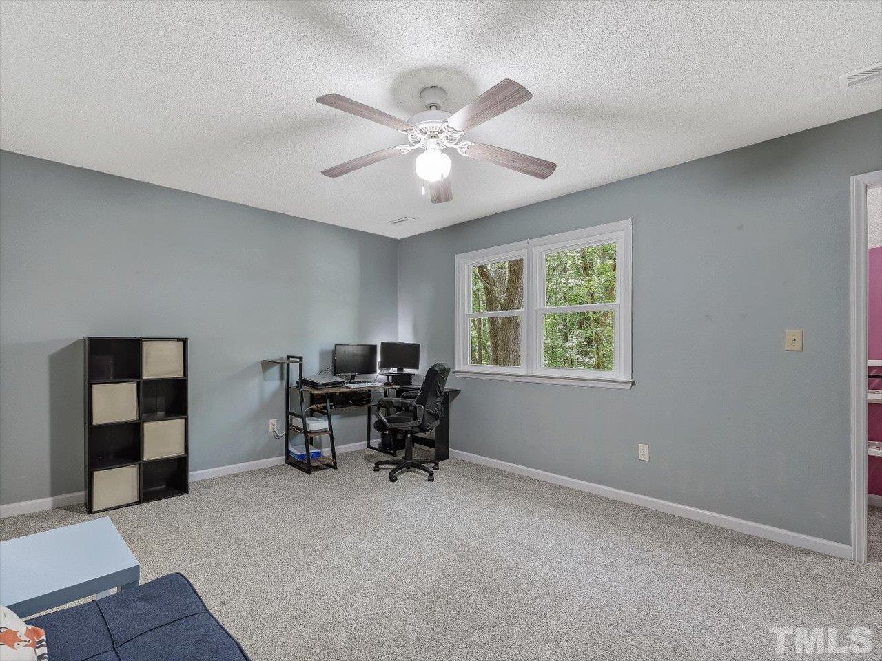 115 Inverness Court Cary, NC 27511 - Photo 22 of 25 a work room with furniture and window