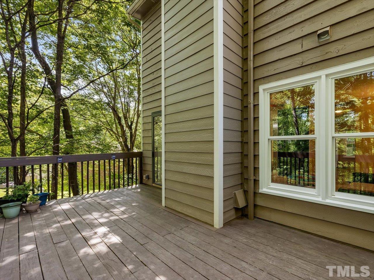 115 Inverness Court Cary, NC 27511 - Photo 9 of 25 a view of a balcony with stairs