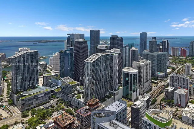 a view of a city with tall buildings