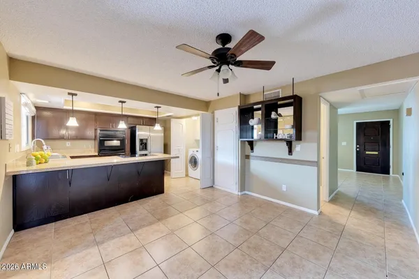a view of a living room and window