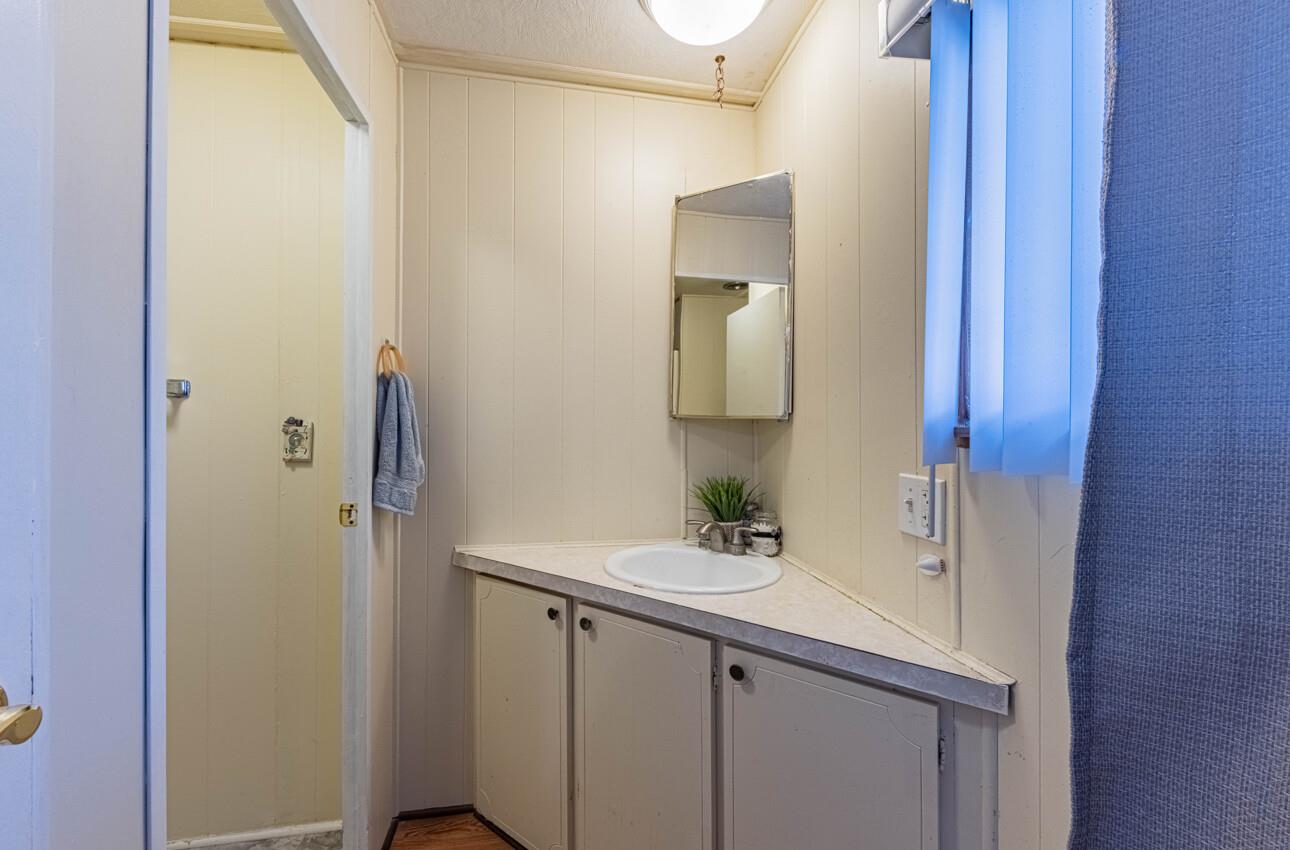 55 San Juan Grade Road, Unit 79 Salinas, CA 93906 - Photo 13 of 22 a bathroom with a sink and a mirror