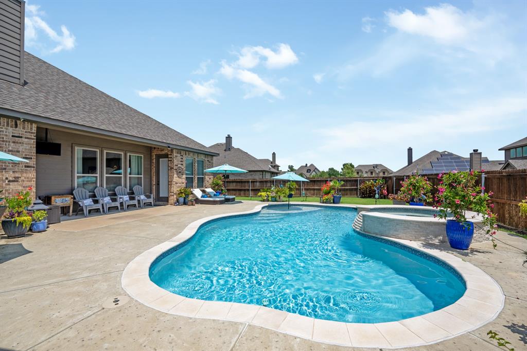834 Rustic Trail Midlothian, TX 76065 - Photo 28 of 29 Covered patio offers some shade.