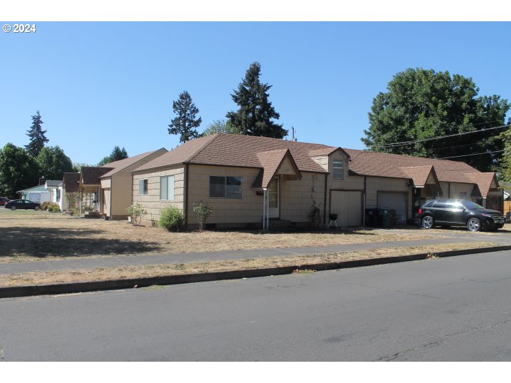 848 N Street Springfield, OR 97477 - Photo 1 of 33 a front view of a house with a yard