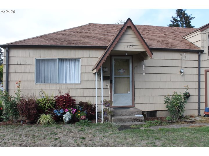 848 N Street Springfield, OR 97477 - Photo 18 of 33 a front view of a house with a garden