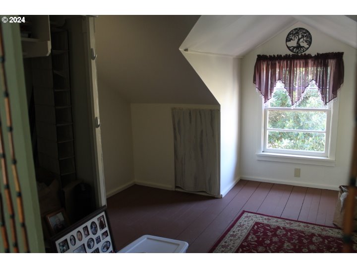 848 N Street Springfield, OR 97477 - Photo 20 of 33 a view of an empty room with wooden floor and a window