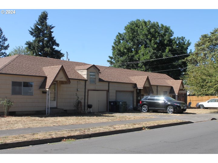 848 N Street Springfield, OR 97477 - Photo 3 of 33 a view of a street that has a parked car