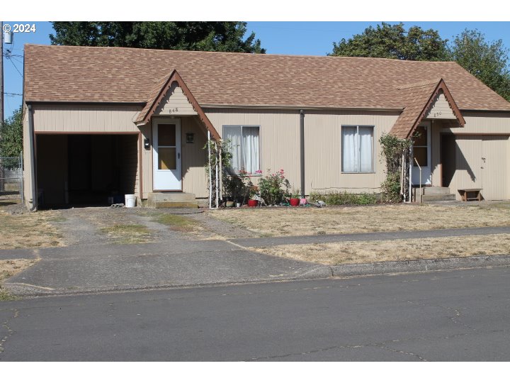 848 N Street Springfield, OR 97477 - Photo 6 of 33 a front view of a house with a outdoor space